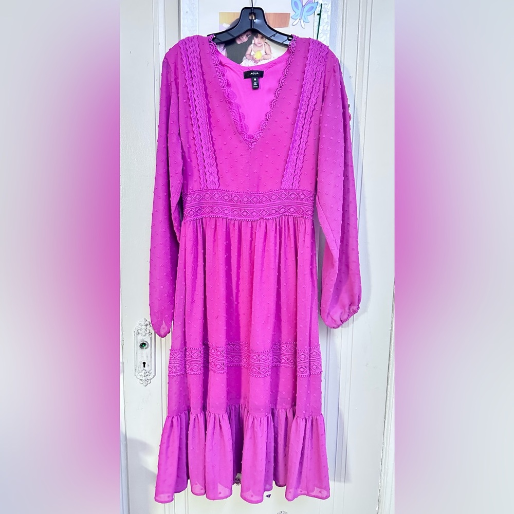 Beautiful pink below the knee, long sleeve dress.